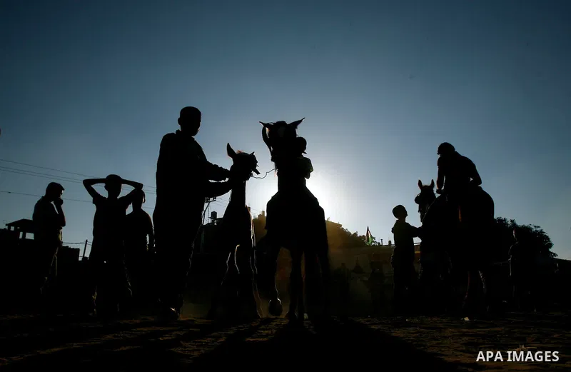 Palestinian children are seen during a Hamas rally ahead of Nakba, in Rafah refugee camp, Gaza City, 11 May 2012. Palestinians mark the 64rd anniversary of 'Nakba', or catastrophe, in reference to the creation of the sta...