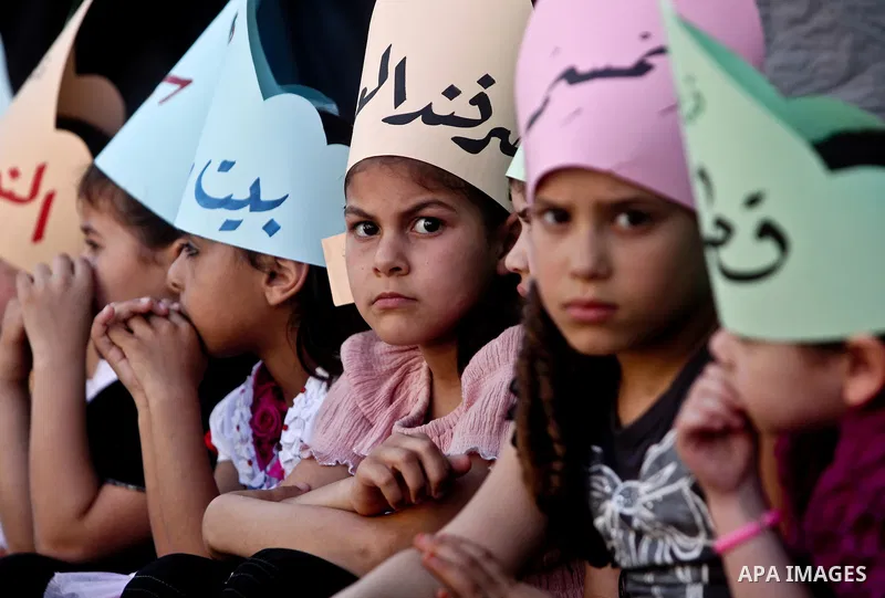 Palestinians attend a rally marking the anniversary of the "Nakba", Arabic for catastrophe, at the Shati refugee camp in Gaza City, Friday, May 11, 2012. The Nakba commemorations mark the uprooting of Palestinians who fl...