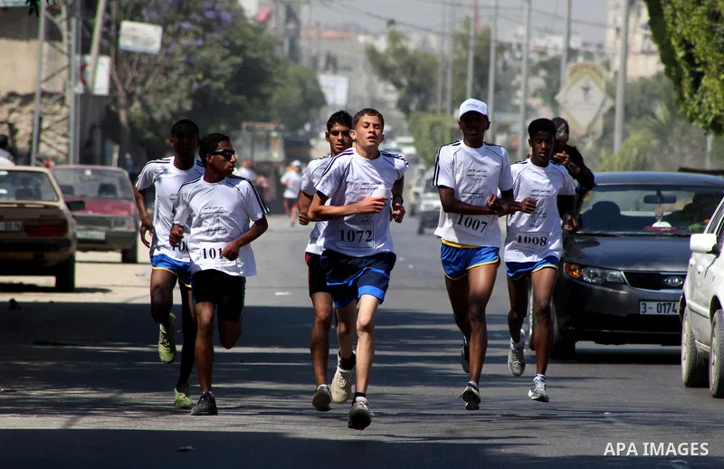 Palestinians Participant compete "Marathon of Return" near to the Erez crossing in the northern Gaza Strip on May 12, 2012. The Nakba commemorations mark the uprooting of Palestinians who fled or were driven out of their...