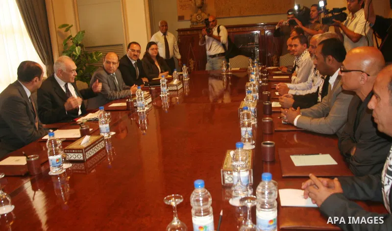 Palestinians delegation of released prisoners meet with Egyptian Foreign Minister Mohammed Kamel Amr in Egypt on May 12, 2012. Photo by Emad Ashtawy