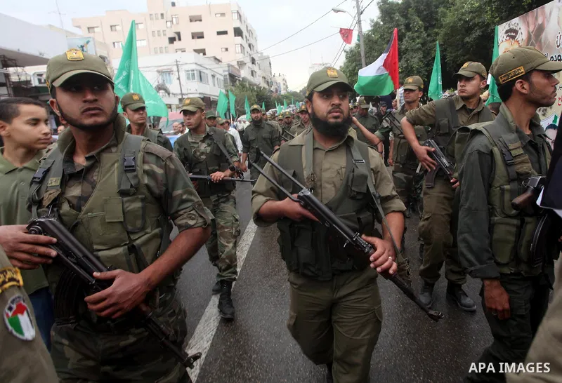 Palestinian Hamas police officers take part in a rally to show solidarity with prisoners held in Israeli jails, in Gaza City May 14, 2012. One in three of the 4,800 Palestinians serving time in Israeli jails began refusi...