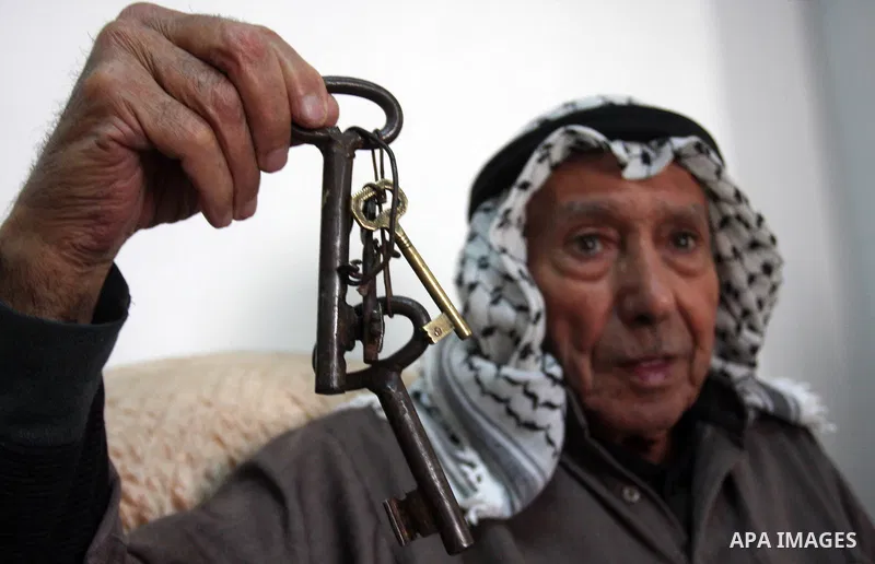 A Palestinian refugee elderly Holds the keys, a day before Palestinians mark the 'Nakba' Day (Day of the catastrophe), in the Al Jalazoun refugee camp in the West Bank City of Ramallah on 14 May 2012. 'Nakba' Day for the...