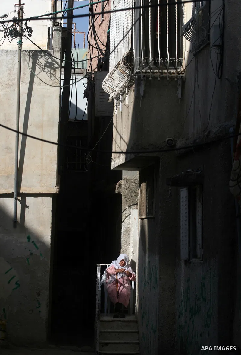 A Palestinian refugee elderly woman, set in front of her house, a day before Palestinians mark the 'Nakba' Day (Day of the catastrophe), in the Al amari refugee camp in the West Bank City of Ramallah on 14 May 2012. 'Nak...