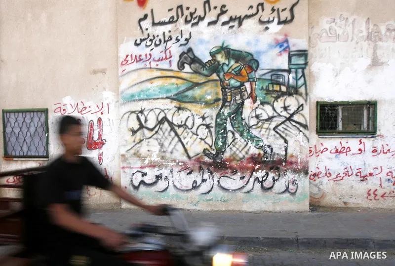 A Palestinian boy plays outside their home in the Rafah refugee camp in the southern Gaza Strip on May 13, 2012. 'Nakba' Day for the Palestinians is an annual day of commemoration of the displacement that followed the Is...
