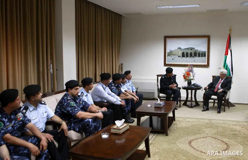 Palestinian President, Mahmoud Abbas (Abu Mazen) meets with a delegation from the Palestinian police in the West Bank City of Ramallah, on May 15, 2012. Photo by Thaer Ganaim