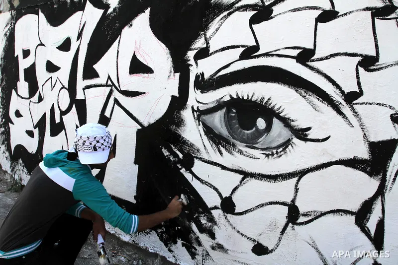 Palestinian artists paint murals marking Nakba in Gaza City May 15, 2012. Palestinians mark Nakba, or catastrophe, of Israel's founding in a 1948 war, when hundreds of thousands of their brethren fled or were forced to l...