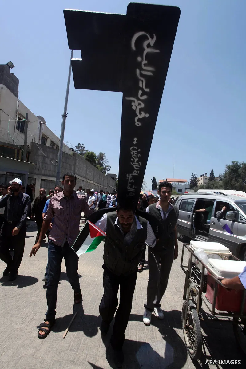 Palestinians hold keys symbolizing keys to houses left by Palestinians in 1948. Palestinians take part in a mass demonstration in front of UN headquarters of UNESCO marking Nakba when Palestinians were forced to leave th...