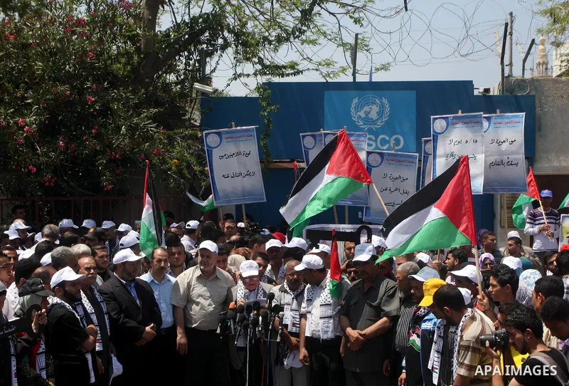 Palestinians participate in a rally marking Al-Nakba, commemorating the displacement of Palestinians in 1948 due to the declaration of the state of Israel, in Gaza City, Gaza Strip, 15 May 2012. Thousands marched in the...