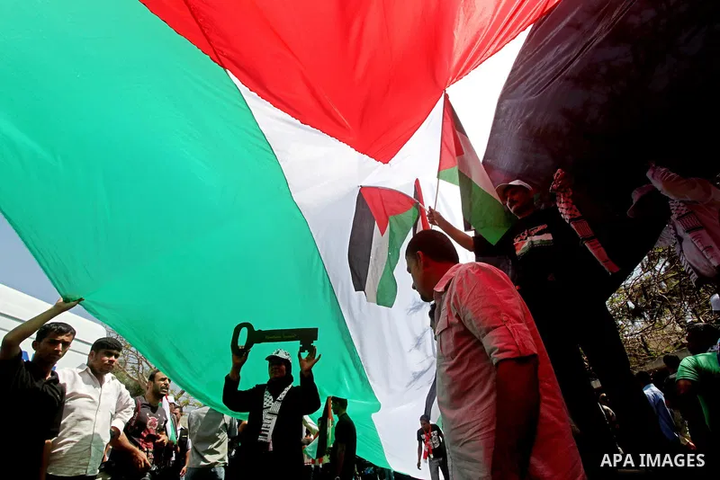 Palestinians participate in a rally marking Al-Nakba, commemorating the displacement of Palestinians in 1948 due to the declaration of the state of Israel, in Gaza City, Gaza Strip, 15 May 2012. Thousands marched in the...