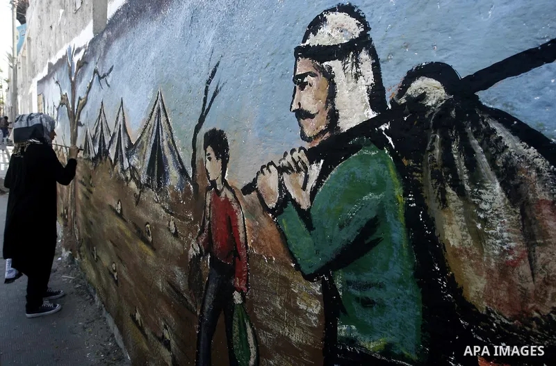 Palestinian artists paint murals marking Nakba in Gaza City May 15, 2012. Palestinians mark Nakba, or catastrophe, of Israel's founding in a 1948 war, when hundreds of thousands of their brethren fled or were forced to l...