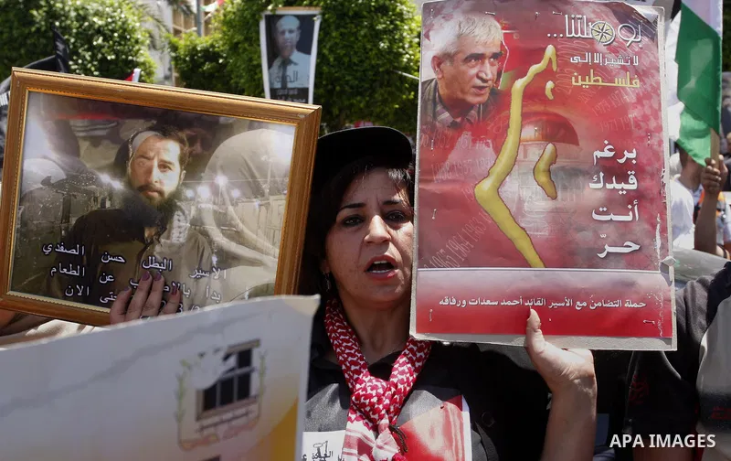 Palestinian women shout slogans against Israel during a rally marking the 64th anniversary of the 'Nakba' ('catastrophe') in Nablus, the West Bank, 15 May 2012. Thousands marched in the West Bank and Gaza Strip, commemor...