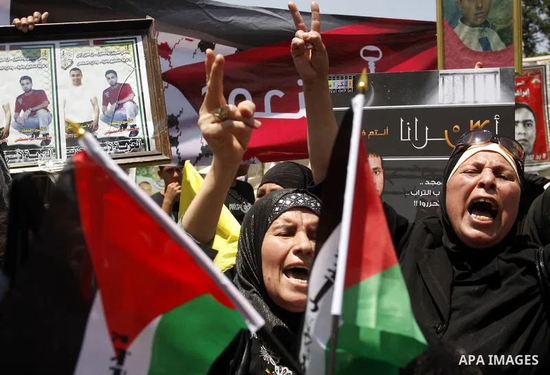 Palestinian women shout slogans against Israel during a rally marking the 64th anniversary of the 'Nakba' ('catastrophe') in Nablus, the West Bank, 15 May 2012. Thousands marched in the West Bank and Gaza Strip, commemor...