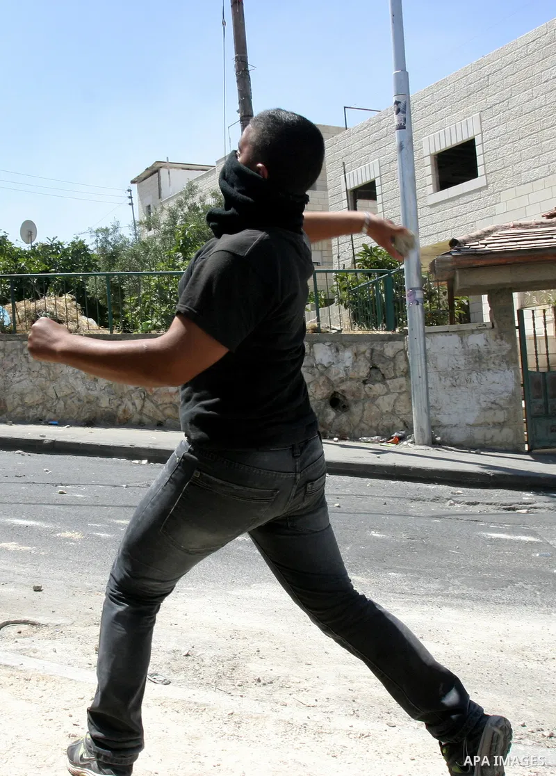 Palestinian stone-throwers clash with Israeli police in the East Jerusalem neighbourhood of Issawiya May 15, 2012. Israeli security forces were on high alert for violence on Tuesday, the day when Palestinians mark "Nakba...