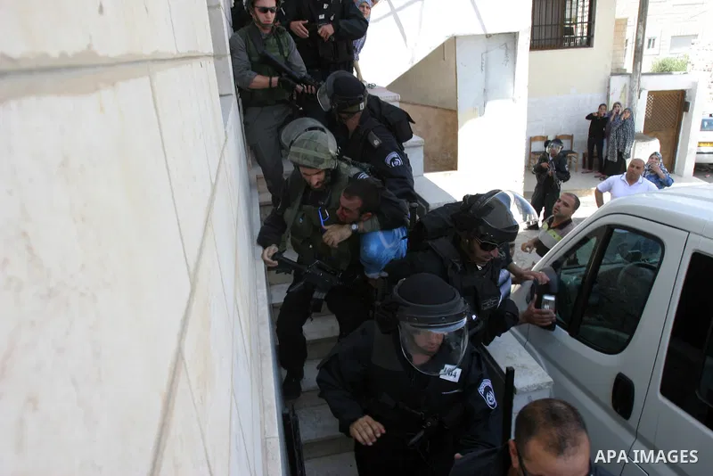 Israeli police officers detain a Palestinian after minor clashes between Palestinian stone-throwers and police in the East Jerusalem neighbourhood of Issawiya May 15, 2012. Israeli security forces were on high alert for...
