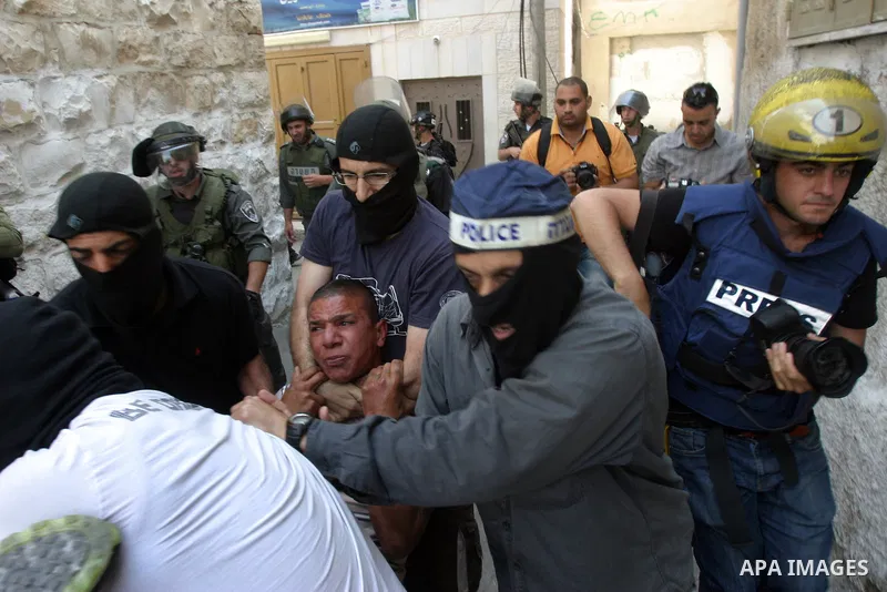 Israeli police officers detain a Palestinian after minor clashes between Palestinian stone-throwers and police in the East Jerusalem neighbourhood of Issawiya May 15, 2012. Israeli security forces were on high alert for...