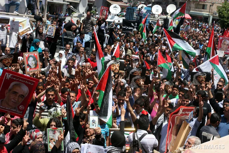 Palestinians attend a rally marking Al-Nakba Day in the West Bank city of Ramallah, on May 15, 2012. The Palestinians continued to rally in the West Bank and the Gaza Strip to mark al- Nakba Day when thousands of Palesti...