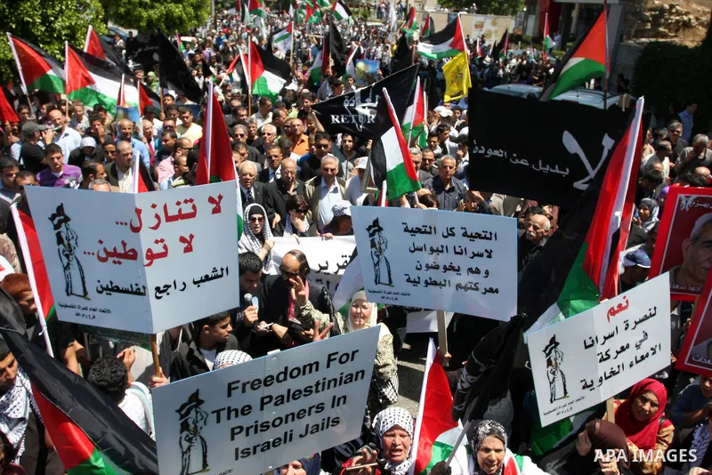 Palestinians attend a rally marking Al-Nakba Day in the West Bank city of Ramallah, on May 15, 2012. The Palestinians continued to rally in the West Bank and the Gaza Strip to mark al- Nakba Day when thousands of Palesti...