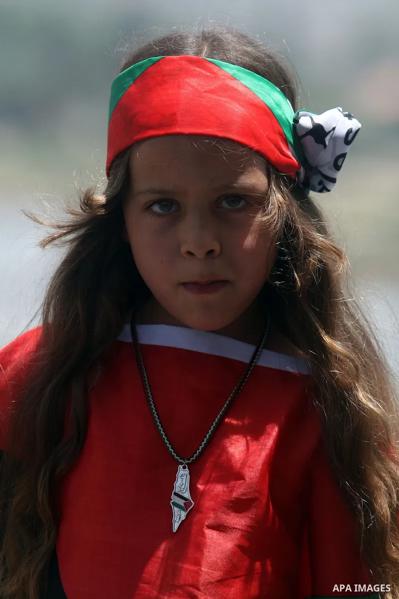 Palestinian child protests during a weekly demonstration in the West Bank, village of Nabi Saleh near Ramallah on Friday, May 18, 2012. Photo by Issam Rimawi