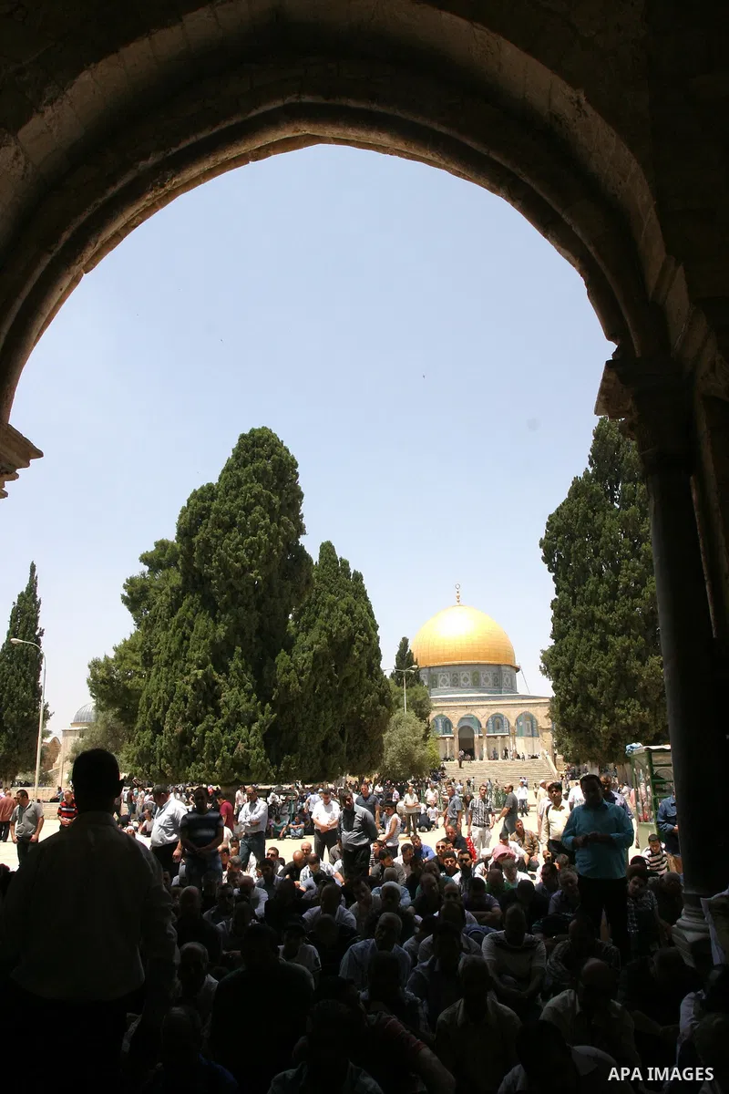 Palestinian Muslim worshippers participate Friday prayers, at the Al Aqsa Mosque compound, in Jerusalem's old city on May 18, 2012. Photo by Mahfouz Abu Turk