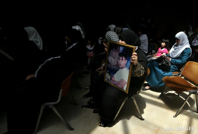 Relatives of Palestinian prisoners held in israeli jails attend a celebration to honor Palestinian journalists by Islamic Jihad movement in Gaza City on 19 May 2012. Photo by Ali Jadallah
