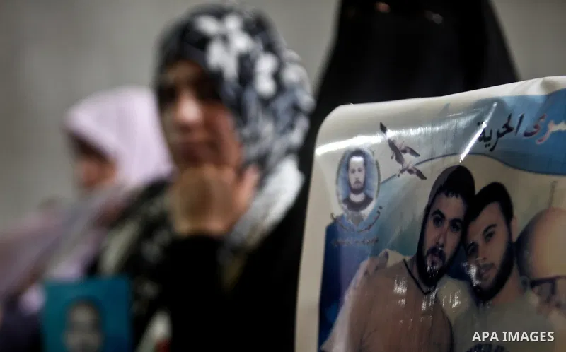 Relatives of Palestinian prisoners held in israeli jails attend a celebration to honor Palestinian journalists by Islamic Jihad movement in Gaza City on 19 May 2012. Photo by Ali Jadallah