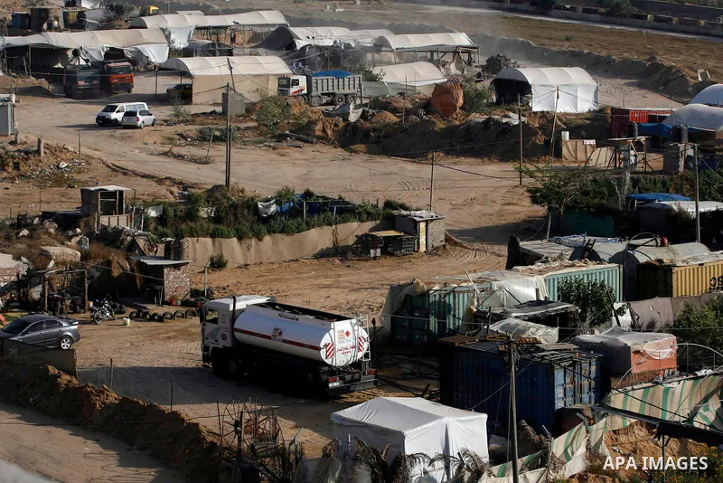 Palestinians transport goods by smuggling tunnels on the border between Egypt and Gaza in the southern Gaza Strip at the Rafah Refugee Camp on May 19, 2012. Living conditions in Gaza have deteriorated because of Israeli...