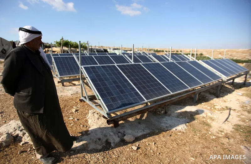 Palestinian Mohammed Nawaj'a inspects the project to generate alternative energy in his own land, near Jewish settlement of Susiya, in southern Hebron Khirbet Susiya, the West Bank on May 20, 2012. This projects was supp...