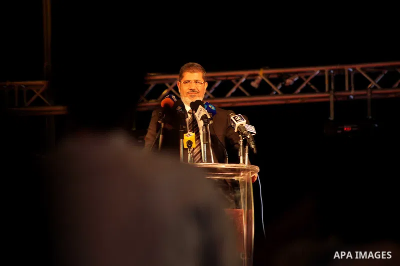 Mohamed Mursi, head of the Muslim Brotherhood's political party and the Brotherhood's presidential candidate, speaks during his last campaign rally in front of the Abdeen Palace Museum in Cairo May 20, 2012. Mursi has ca...