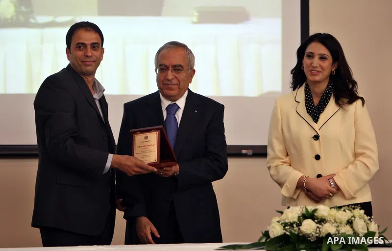 Palestinian Prime Minister Salam Fayyad during celebration of the accession of the Central Bureau of Statistics published data on the standard, in the West Bank on May 22, 2012. Photo by Mustafa Abu Dayeh