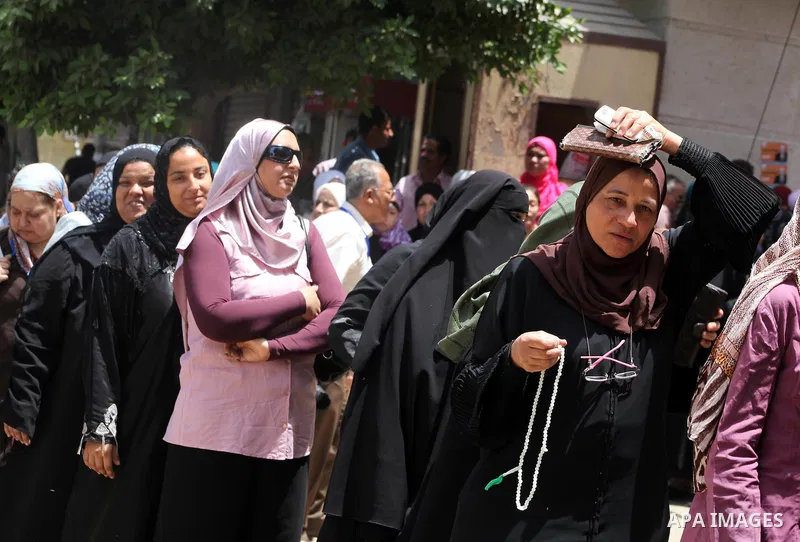 Egyptians wait to vote during second day of the first round of Egypt's presidential elections in Cairo, Egypt, 24 May 2012. Media reports quoting state-television and observers said that far less Egyptians turned out to...