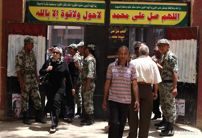 Egyptians wait to vote during second day of the first round of Egypt's presidential elections in Cairo, Egypt, 24 May 2012. Media reports quoting state-television and observers said that far less Egyptians turned out to...