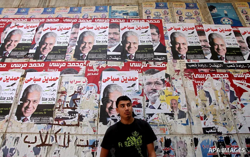 Egyptian man waits to vote during second day of the first round of Egypt's presidential elections in Cairo, Egypt, 24 May 2012. Media reports quoting state-television and observers said that far less Egyptians turned out...