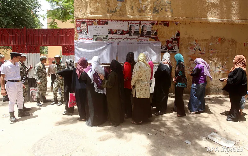 Egyptians wait to vote during second day of the first round of Egypt's presidential elections in Cairo, Egypt, 24 May 2012. Media reports quoting state-television and observers said that far less Egyptians turned out to...