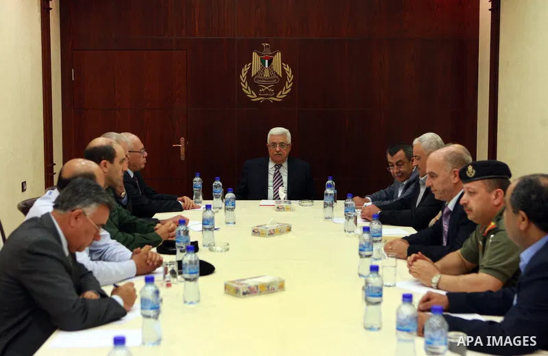 Palestinian President Mahmoud Abbas (Abu Mazen) meets with security chiefs at the presidential headquarters in the West Bank city of Ramallah on May 24, 2012. Photo by Thaer Ganaim