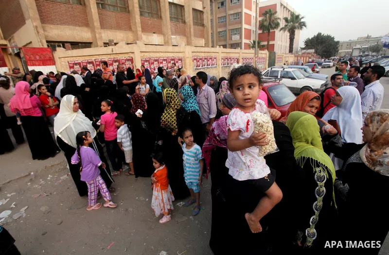 Voters wait outside a polling station in Cairo during presidential elections May 24, 2012. Egypt resumes its first free presidential election on Thursday after voting passed off mostly calmly on the first day apart from...