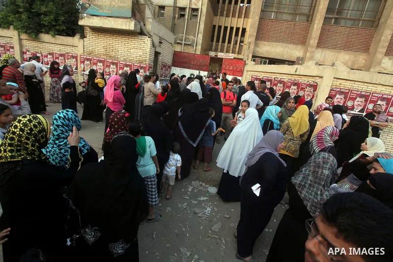 Voters wait outside a polling station in Cairo during presidential elections May 24, 2012. Egypt resumes its first free presidential election on Thursday after voting passed off mostly calmly on the first day apart from...