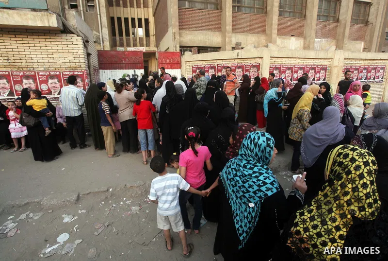 Voters wait outside a polling station in Cairo during presidential elections May 24, 2012. Egypt resumes its first free presidential election on Thursday after voting passed off mostly calmly on the first day apart from...