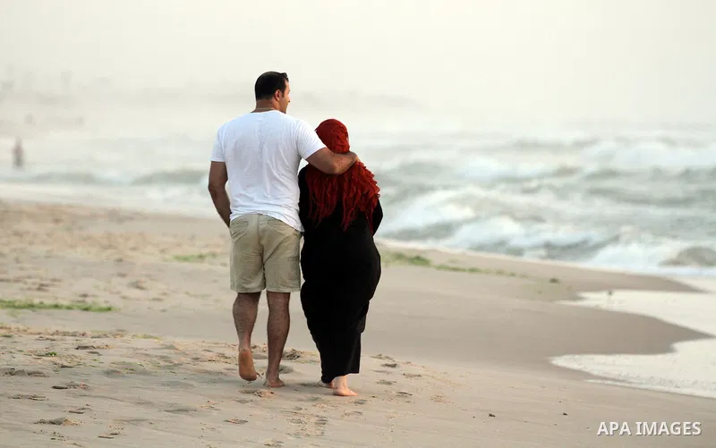 Palestinians enjoy at the beach in Gaza City on May 24, 2012. Gaza beach is the only outlet for the Palestinians after tightening the Israeli blockade on the Gaza Strip. Photo by Majdi Fathi