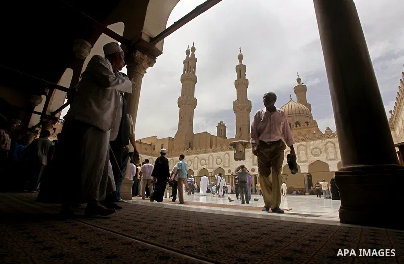 Egyptians attend friday prayers at Al Azhar Mosque in cairo city, 25 May 2012. Many residents and voters now wait in anticipation of the results. following the excitement of casting votes in Egypt's first legitimate demo...