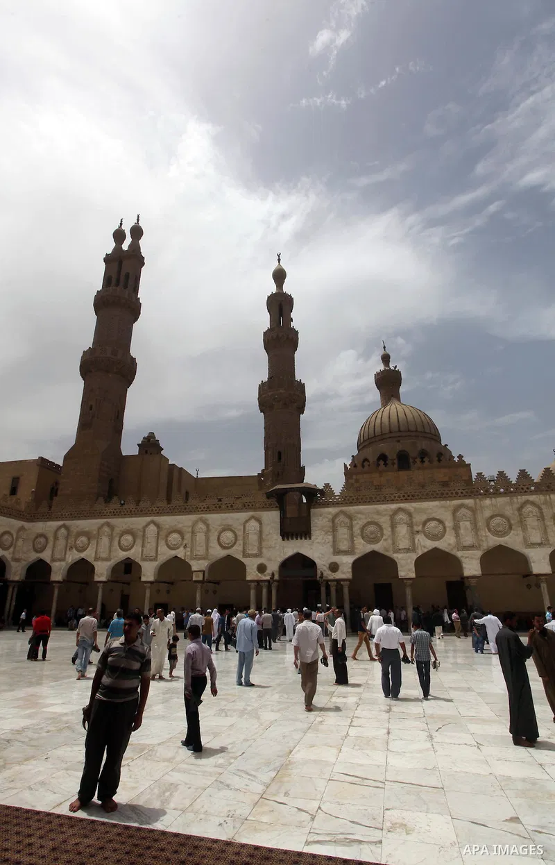 Egyptians attend friday prayers at Al Azhar Mosque in cairo city, 25 May 2012. Many residents and voters now wait in anticipation of the results. following the excitement of casting votes in Egypt's first legitimate demo...