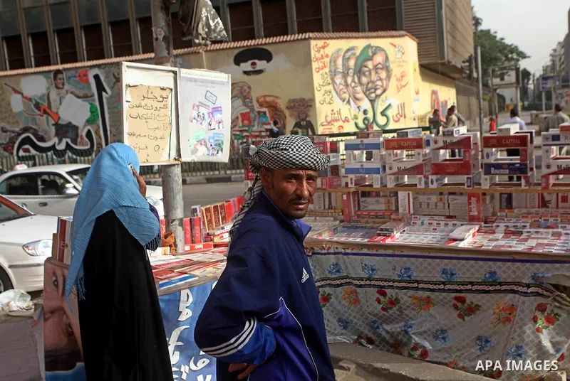 A vendor sells cigarettes at Tahrir Square in Cairo May 25, 2012. Photo by Ashraf Amra