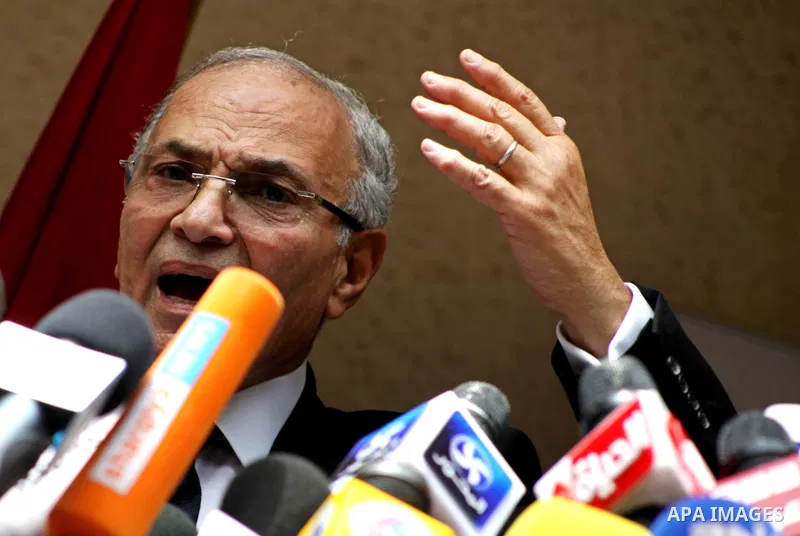 Egyptian presidential candidate Ahmed Shafiq speaks to the media during a press conference at his office in Cairo, Egypt, Saturday, May 26, 2012. Egyptian presidential candidate Ahmed Shafiq paid tribute Saturday to the...