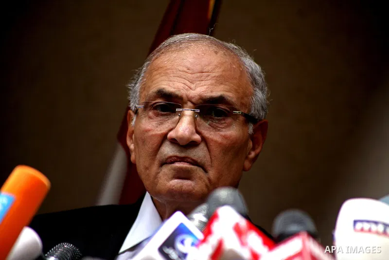 Egyptian presidential candidate Ahmed Shafiq speaks to the media during a press conference at his office in Cairo, Egypt, Saturday, May 26, 2012. Egyptian presidential candidate Ahmed Shafiq paid tribute Saturday to the...