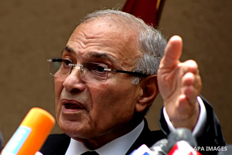 Egyptian presidential candidate Ahmed Shafiq speaks to the media during a press conference at his office in Cairo, Egypt, Saturday, May 26, 2012. Egyptian presidential candidate Ahmed Shafiq paid tribute Saturday to the...