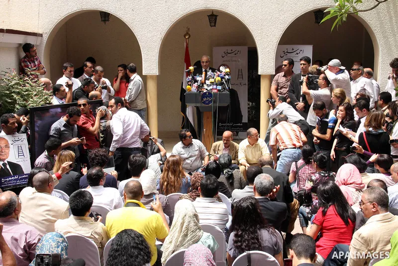 Egyptian presidential candidate Ahmed Shafiq speaks to the media during a press conference at his office in Cairo, Egypt, Saturday, May 26, 2012. Egyptian presidential candidate Ahmed Shafiq paid tribute Saturday to the...