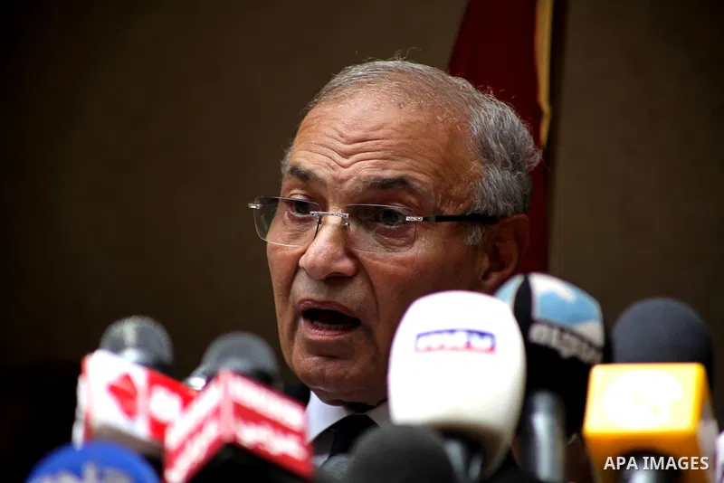 Egyptian presidential candidate Ahmed Shafiq speaks to the media during a press conference at his office in Cairo, Egypt, Saturday, May 26, 2012. Egyptian presidential candidate Ahmed Shafiq paid tribute Saturday to the...