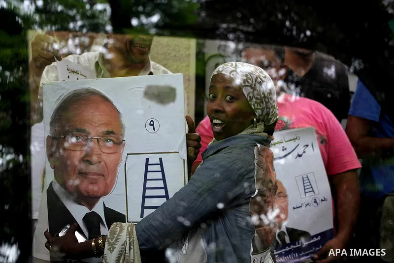 Egyptian presidential candidate Ahmed Shafiq speaks to the media during a press conference at his office in Cairo, Egypt, Saturday, May 26, 2012. Egyptian presidential candidate Ahmed Shafiq paid tribute Saturday to the...