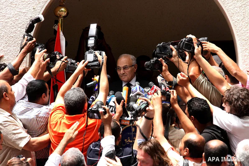 Egyptian presidential candidate Ahmed Shafiq speaks to the media during a press conference at his office in Cairo, Egypt, Saturday, May 26, 2012. Egyptian presidential candidate Ahmed Shafiq paid tribute Saturday to the...