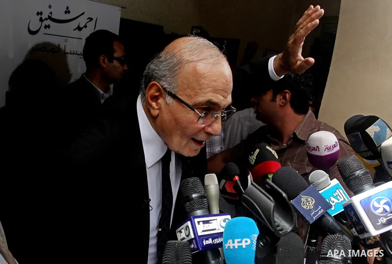 Egyptian presidential candidate Ahmed Shafiq speaks to the media during a press conference at his office in Cairo, Egypt, Saturday, May 26, 2012. Egyptian presidential candidate Ahmed Shafiq paid tribute Saturday to the...
