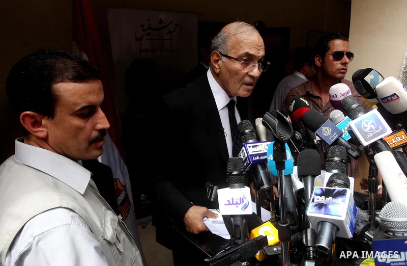 Egyptian presidential candidate Ahmed Shafiq speaks to the media during a press conference at his office in Cairo, Egypt, Saturday, May 26, 2012. Egyptian presidential candidate Ahmed Shafiq paid tribute Saturday to the...